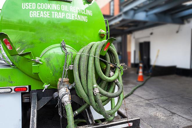 tank truck pumping out a grease trap in Dunwoody, GA